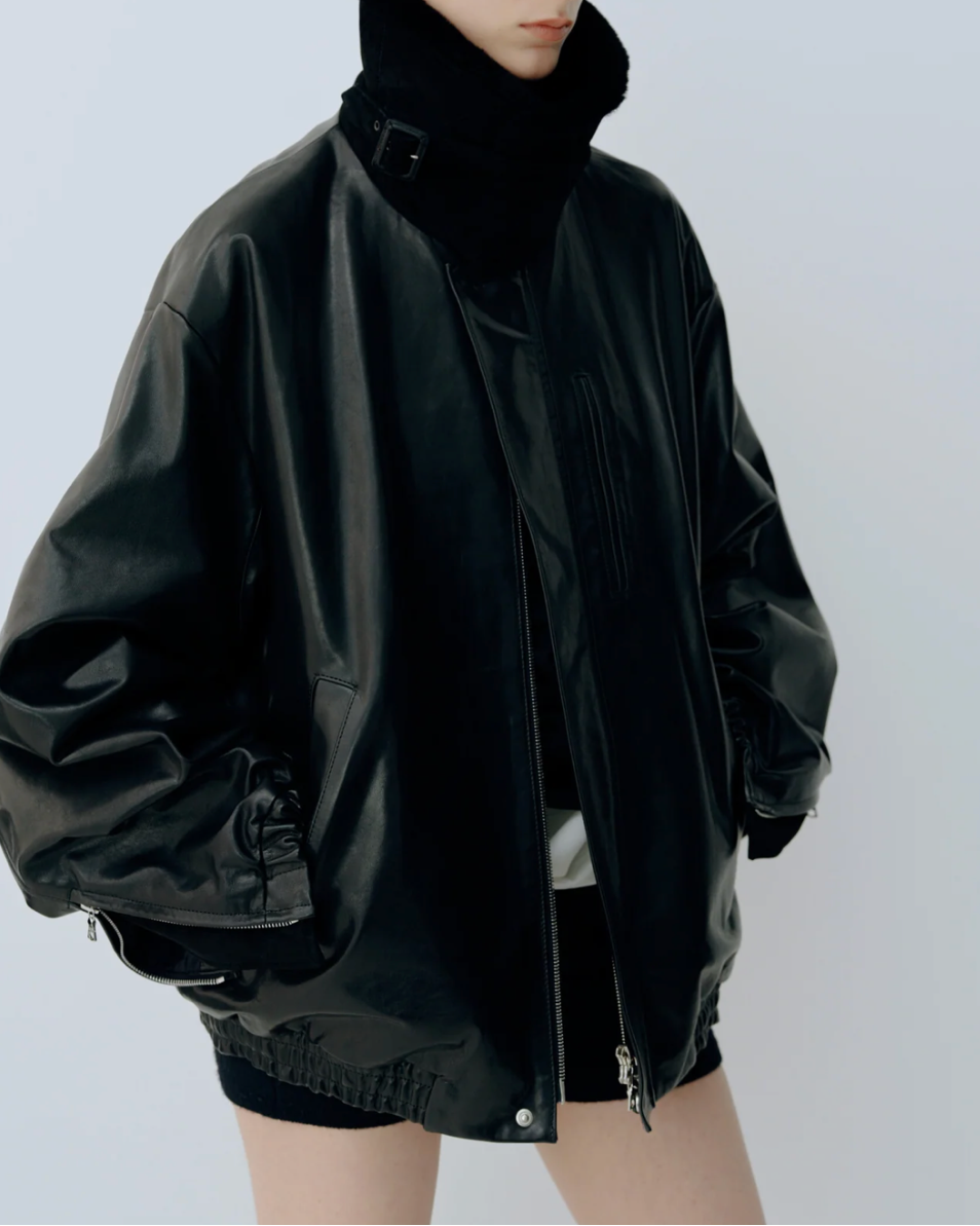 Ssstein - Blouson zippé en cuir col peau lainée
