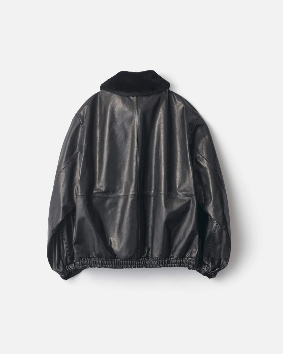 Ssstein - Blouson zippé en cuir col peau lainée